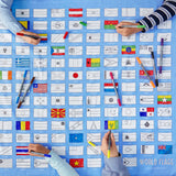 World Flags Tablecloth, 4 children colouring in with pens