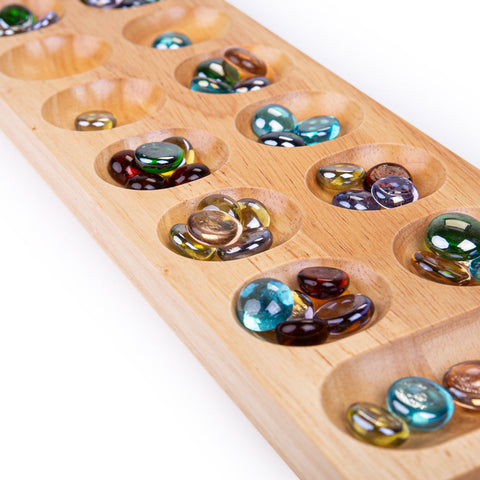 Mancala, close up of board and stones unboxed
