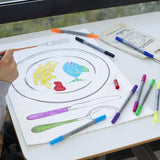 Doodle placemat to go , fish and chips drawing with hand and pens visible