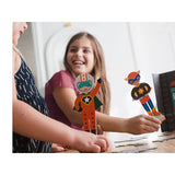 Superheroes - Magnetic Costume Builder, children playing with 2 figures