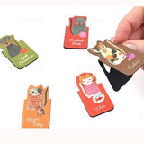 Cool Cats magnetic bookmarks unpackaged, fngers opening one to demo