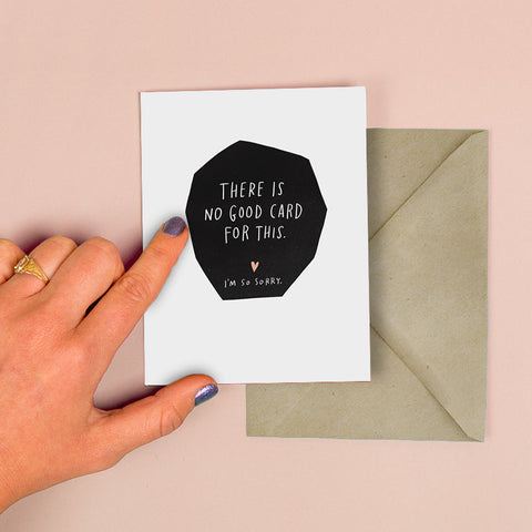 No Good Card  - Greeting Card, with hand and envelope behind on peach background 