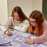 Heroines of History Tablecloth, 2 girls smiling and completing 