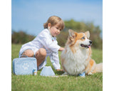 Vet kit lifestyle shot with child and corgi