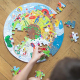 Four Seasons - Circular Puzzle, lifestyle being completed by child 