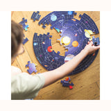Space Explorer -Circular Solar System Floor Puzzle, child completing 