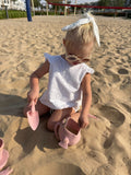 Scrunch scoop child playing at beach 