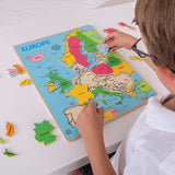 Wooden Europe Inset Puzzle, child completing 