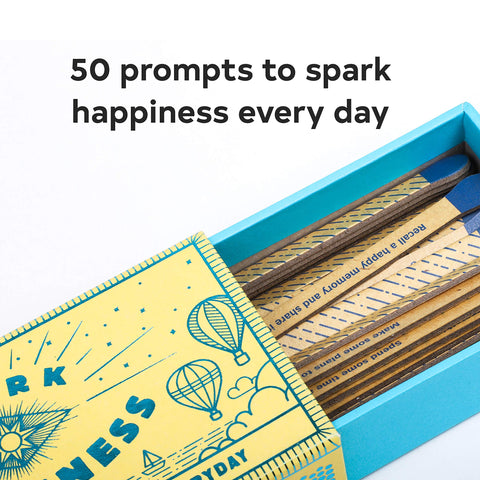 Spark Happiness, open box showing matches, with saying 
