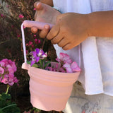 Scrunch In The Garden Gift Set - Old Rose seedling pot carried by child 