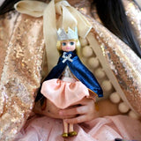 Queen Of The Castle Lottie Doll, unboxed held by child