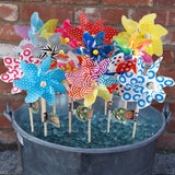 Windmill, bucket of various windmills with labels on sticks