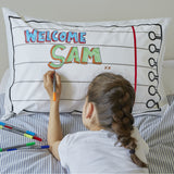 Doodle pillowcase, being drawn on by girl 