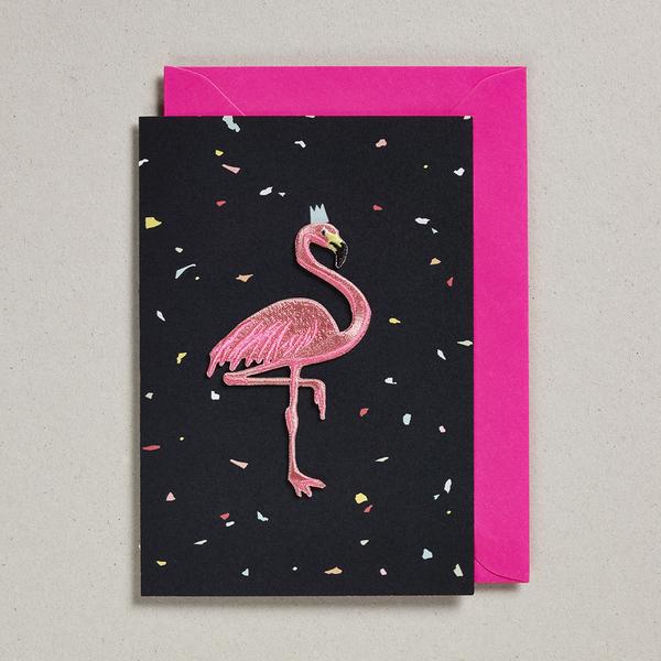 Flamingo Party (black) card and envelope behind 