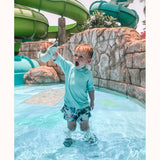 Scrunch Crocodile Jug  - boy in pool