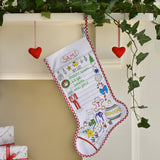 Colour -in Christmas Stocking, completed, hanging from fireplace