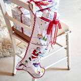Colour -in Christmas Stocking, completed and hanging off chair