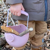 Scrunch Watering Can - lifestyle child holding with sticks in