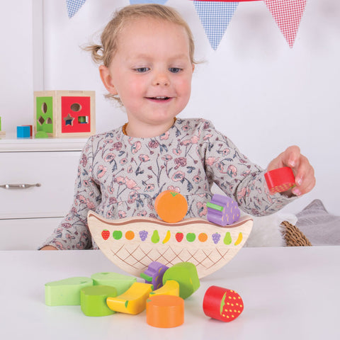 Wooden Fruit Balancing Game, little girl playing