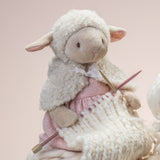 Dylis the lamb, posed knitting 