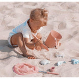 Scrunch Sand Moulds - general life style shot of child with scrunch products 