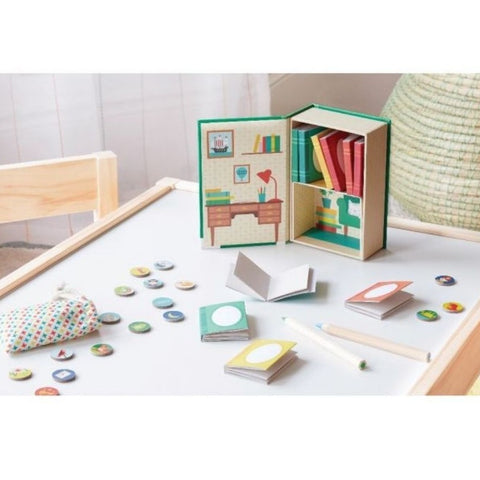 Little Library Storytelling Box , opened with books, coin and pouch on table 