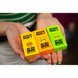 Don't Get Got! - A Secret Mission Party Game, mission cards in 3 x packs held in hands