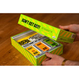 Don't Get Got! - A Secret Mission Party Game, hands opening box, contents visible