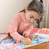 Poppik Panoramic Poster & Stickers - Seasons, girl placing sticker on poster