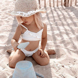 Scrunch Bucket - Duck Egg Blue (& matching spade) little girl playing at beach 