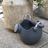 Scrunch Watering Can - French Navy, lifestyle outside shot